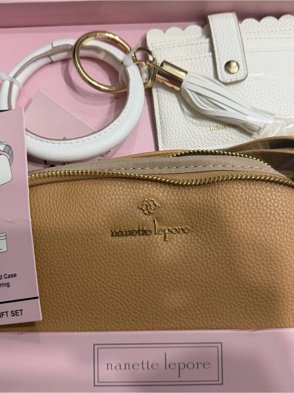 Nanette Lepore Tan Pebbled Leather Cosmetic Pouch with White Tassel & Ring
